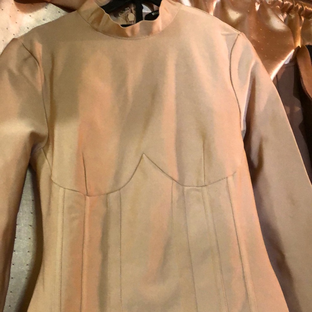 Body shaper New without tag. Size mefium stated in the clothing.